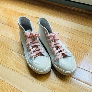 Adidas high top sneakers with 2 inch height lift.